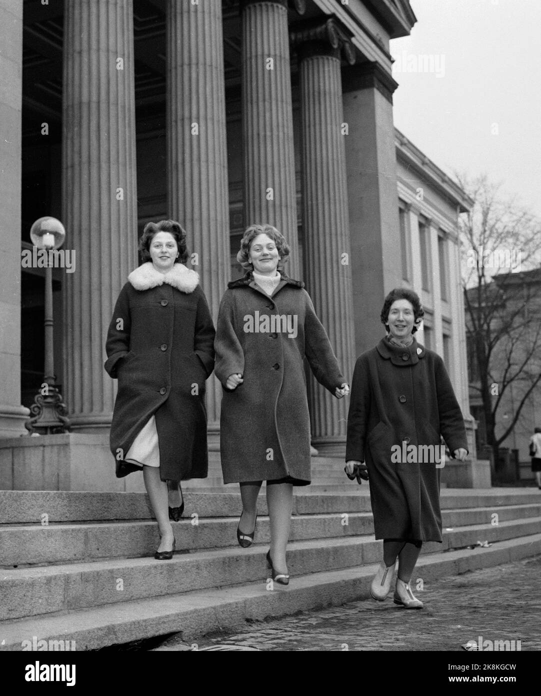 Oslo March 1961 In the wake of the appointment of Norway's first female priest, other female theology students seek one hope. Here are three women studying theology at the University of Oslo. From V: Inger-Lise Petersen, Kirsti Skollerud and Rosemarie Köhn. Photo: Aaserud / Current / NTB Stock Photo