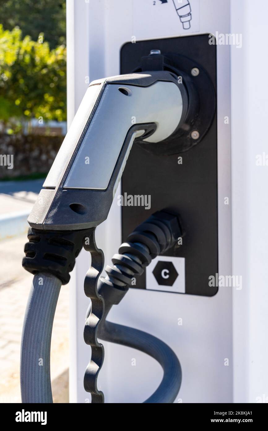 Power cable pump plug in charging power to electric vehicle EV car