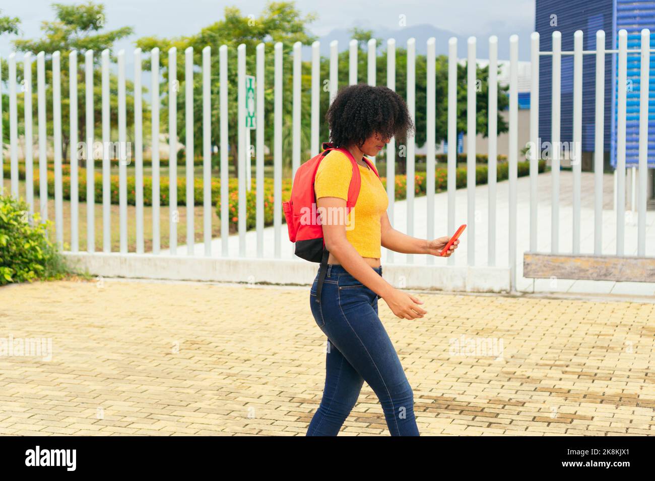 African woman laughing text message hi-res stock photography and images ...
