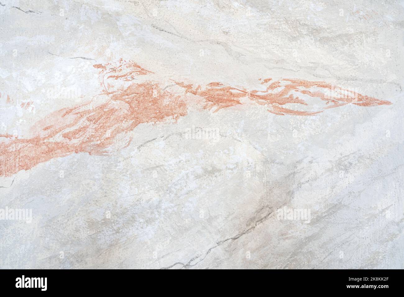 Painted marble pattern on a wall in white pink gray Stock Photo