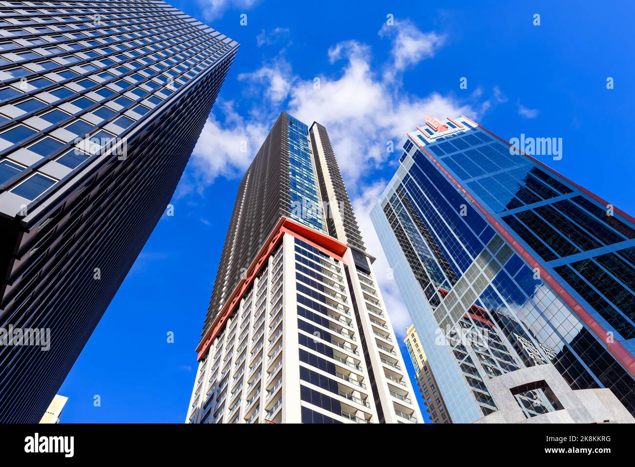 Sydney, NSW, Australia - April 16, 2022: New skyscrapers in Sydney city while looking up from Bathurst Street on a day Stock Photo