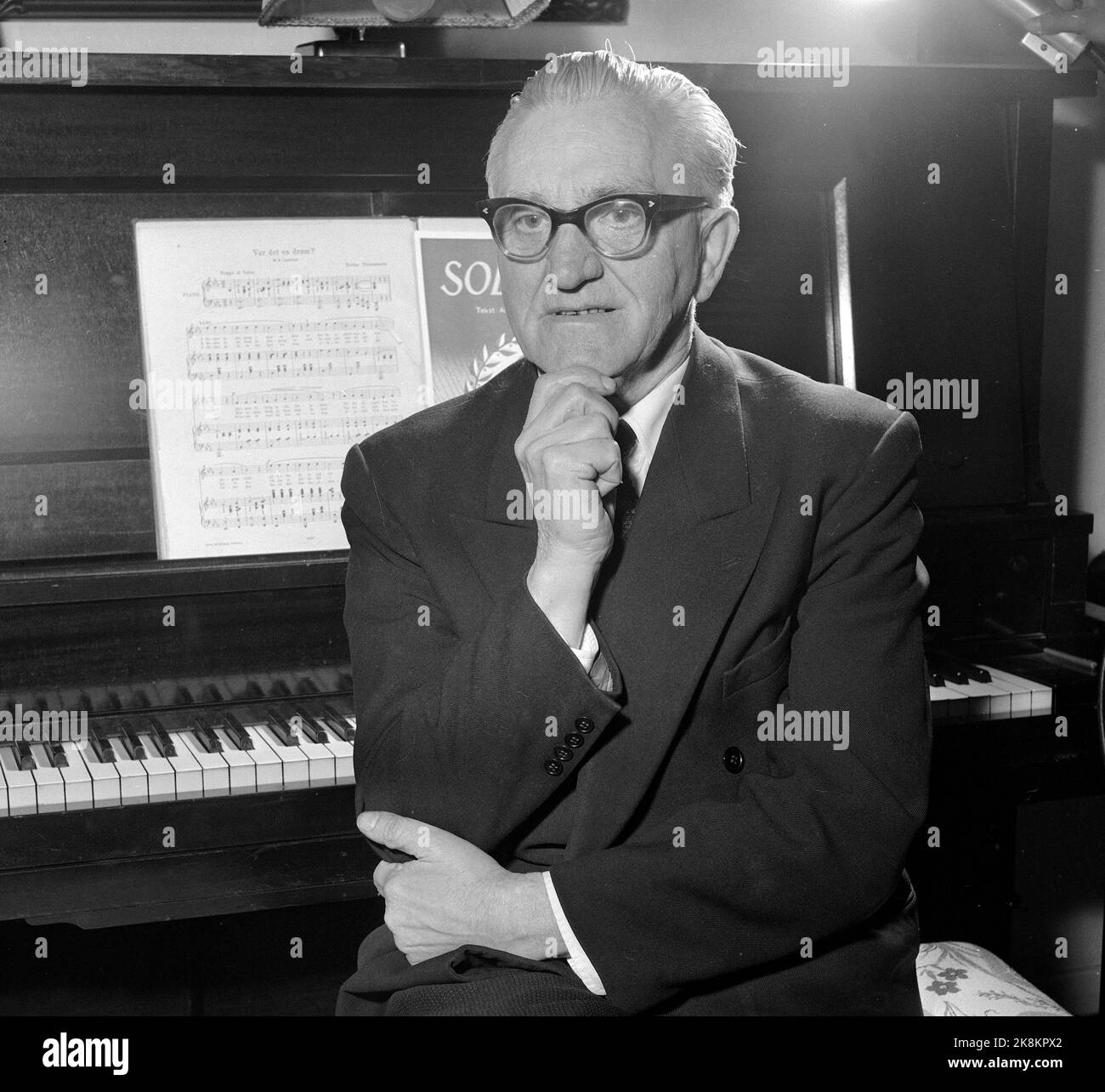 Oslo 195704. The composer Reidar Thommessen (1889-1986) at the piano. Almost 50 years after composing 'it was a dream' or the moonlight roller that many people know who, he was ready to participate in NRK's series 'Tomorrow's Melody' with a new melody. Thommessen's contribution in the competition was 'what the end of the show will be'. Photo: Storløkken / Current / NTB Stock Photo