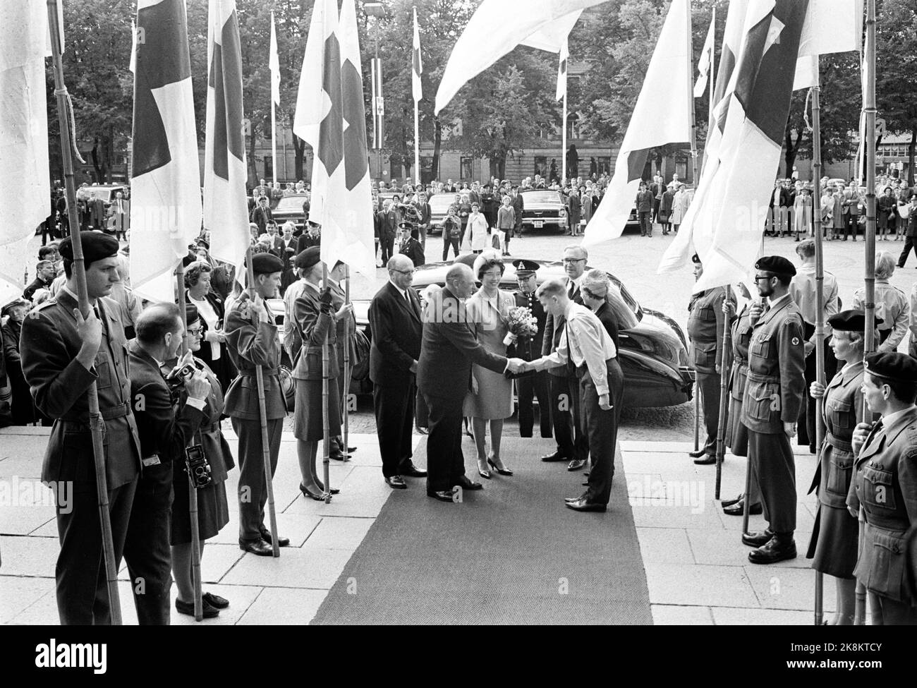 Oslo 19650922 Norway's Red Cross 100th anniversary Party meeting in the University Aula. Here King Olav Aula arrives with Princess Astrid. Photo: NTB Stock Photo