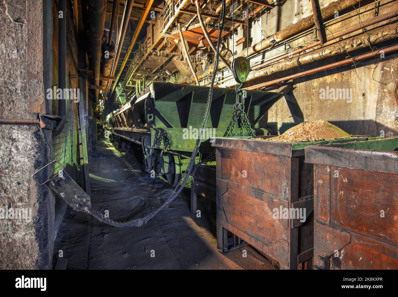 Freight wagon in the industrial workshop of an old factory Stock Photo