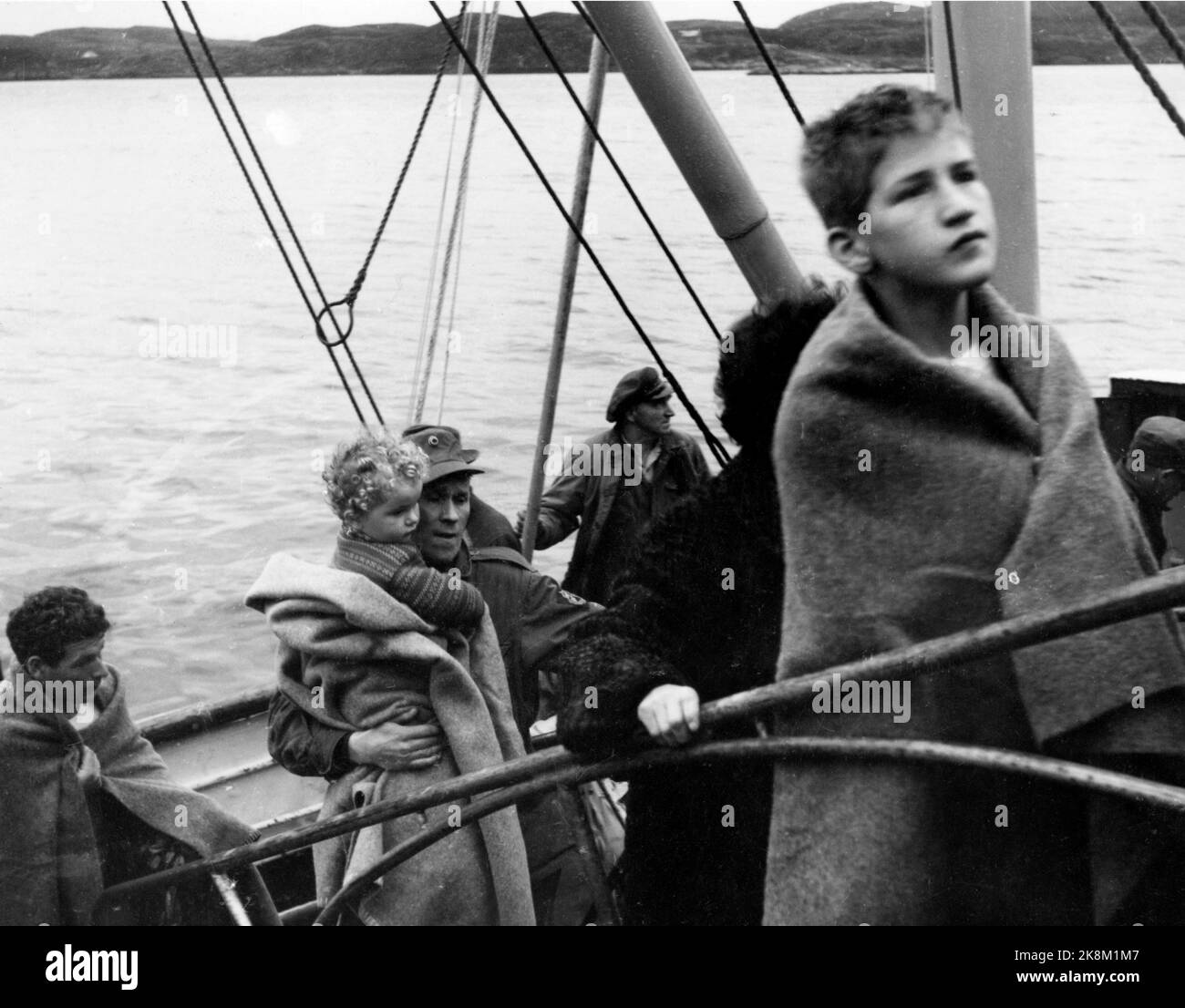 Some of the survivors are brought ashore in rorvik photo hires stock