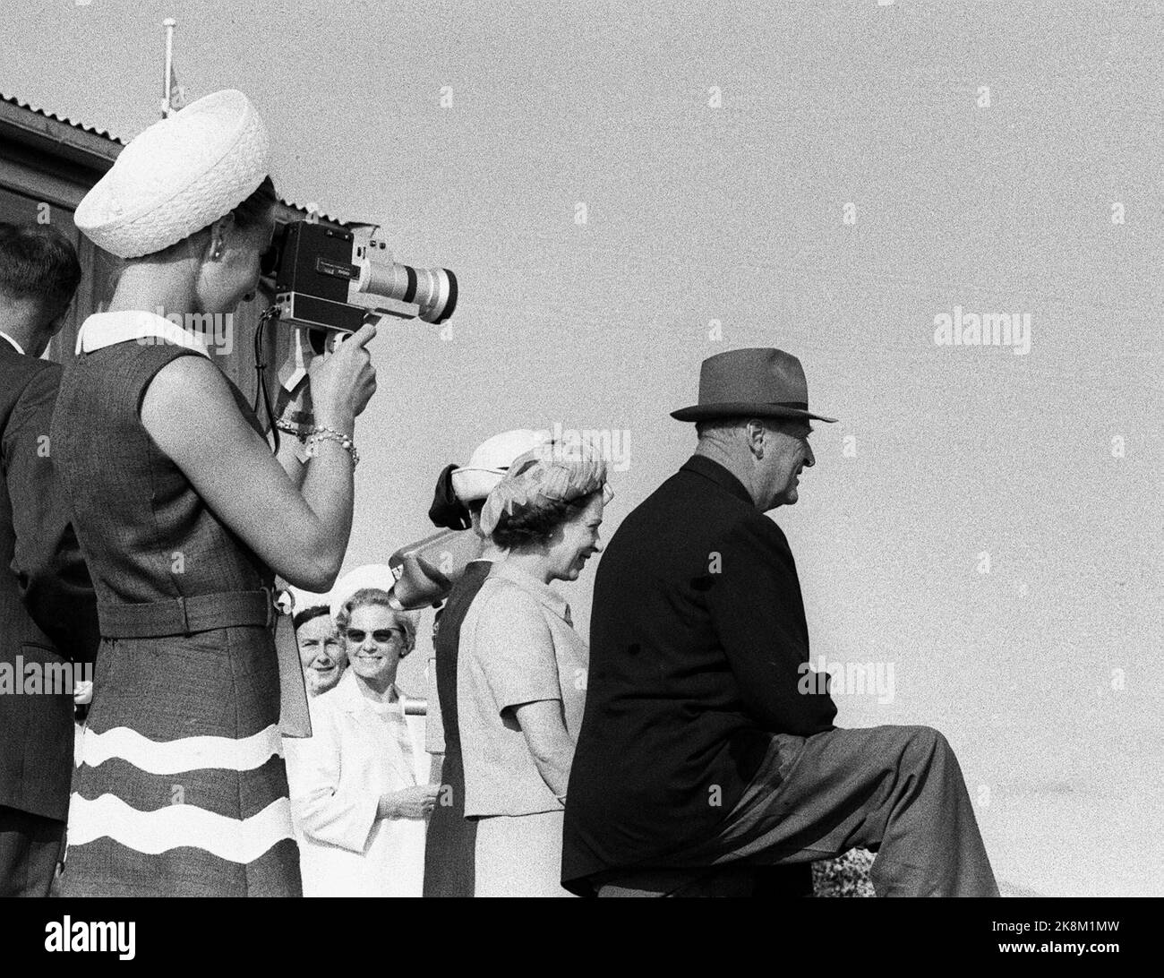 Molde 19690809. Queen Elizabeth II visiting Norway with the family. Here they are on jumping in Molde where crown prince Sonja movies the event. Eg. Crown Princess Sonja, Queen Elizabeth and King Olav. Ntb archive Stock Photo