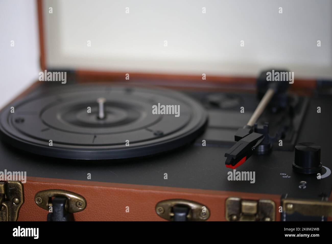 A black and brown vintage suitcase turntable Stock Photo Alamy