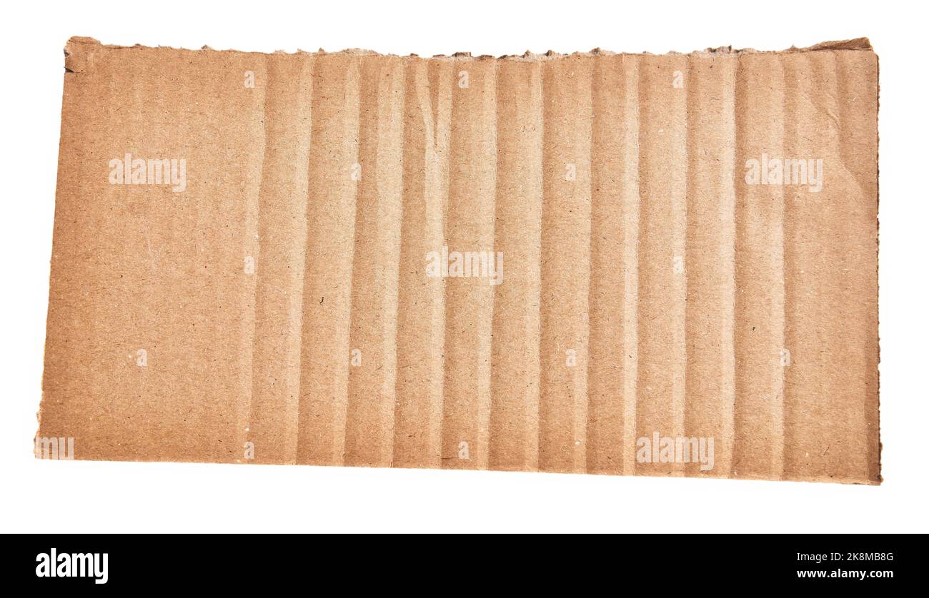 One ripped piece of cardboard material over isolated white background ...
