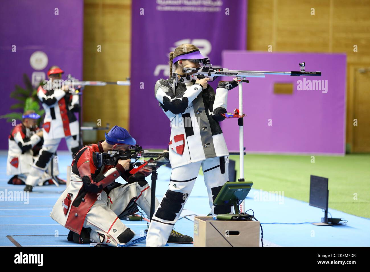 Cairo, Egypt. 24th Oct, 2022. Stephanie Laura Scurrah Grundsoee (1st R)/Steffen Olsen (2nd R) of Denmark and Jenny Stene/Simon Claussen of Norway compete during their 50m rifle 3 positions mixed team gold medal match at the ISSF World Championship Rifle/Pistol in Cairo, Egypt, Oct. 24, 2022. Credit: Ahmed Gomaa/Xinhua/Alamy Live News Stock Photo
