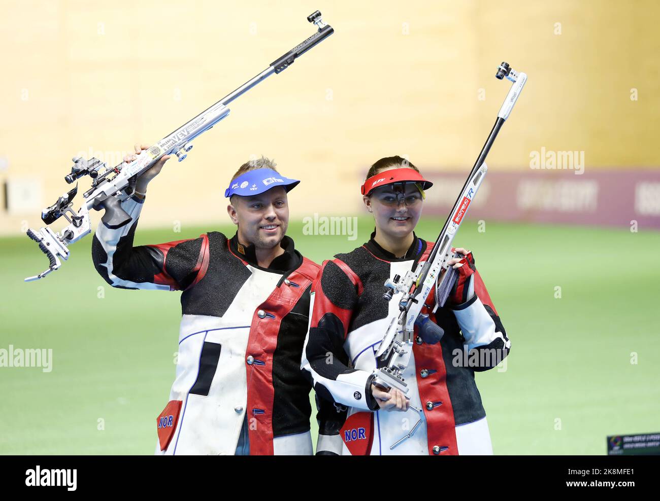 Cairo, Egypt. 24th Oct, 2022. Jenny Stene (R)/Simon Claussen of Norway celebrate after winning the 50m rifle 3 positions mixed team gold medal match against Stephanie Laura Scurrah Grundsoee/Steffen Olsen of Denmark at the ISSF World Championship Rifle/Pistol in Cairo, Egypt, Oct. 24, 2022. Credit: Ahmed Gomaa/Xinhua/Alamy Live News Stock Photo