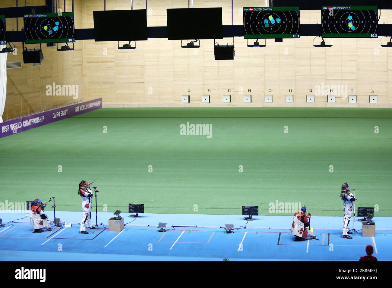 Cairo, Egypt. 24th Oct, 2022. Stephanie Laura Scurrah Grundsoee (1st R)/Steffen Olsen (2nd R) of Denmark and Jenny Stene (2nd L)/Simon Claussen (1st L) of Norway compete during their 50m rifle 3 positions mixed team gold medal match at the ISSF World Championship Rifle/Pistol in Cairo, Egypt, Oct. 24, 2022. Credit: Ahmed Gomaa/Xinhua/Alamy Live News Stock Photo