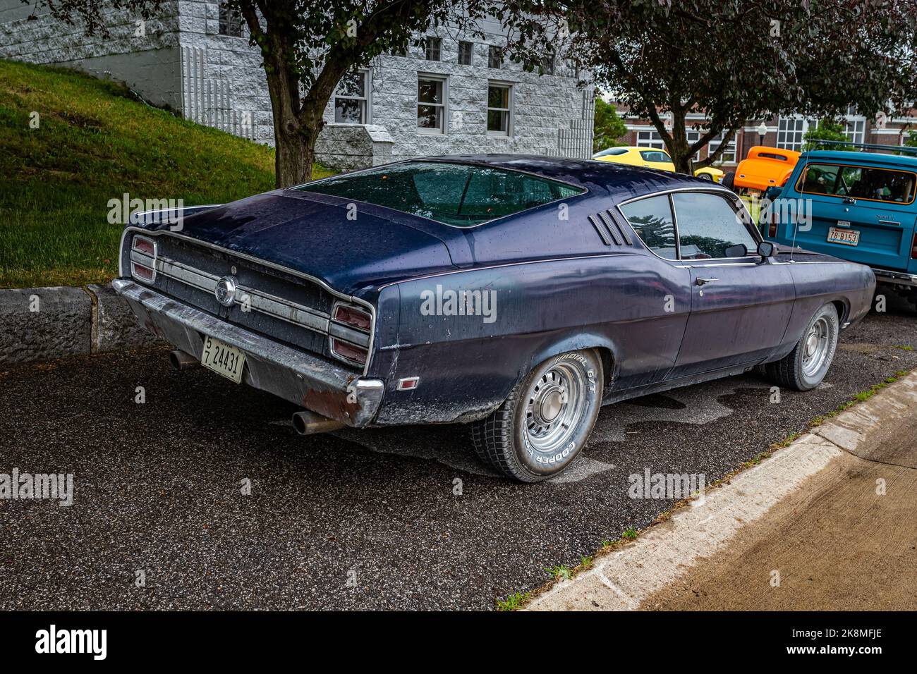 Des Moines, IA - July 01, 2022: High perspective rear corner view of a 1969 Ford Torino Talladega 428 Coupe at a local car show. Stock Photo