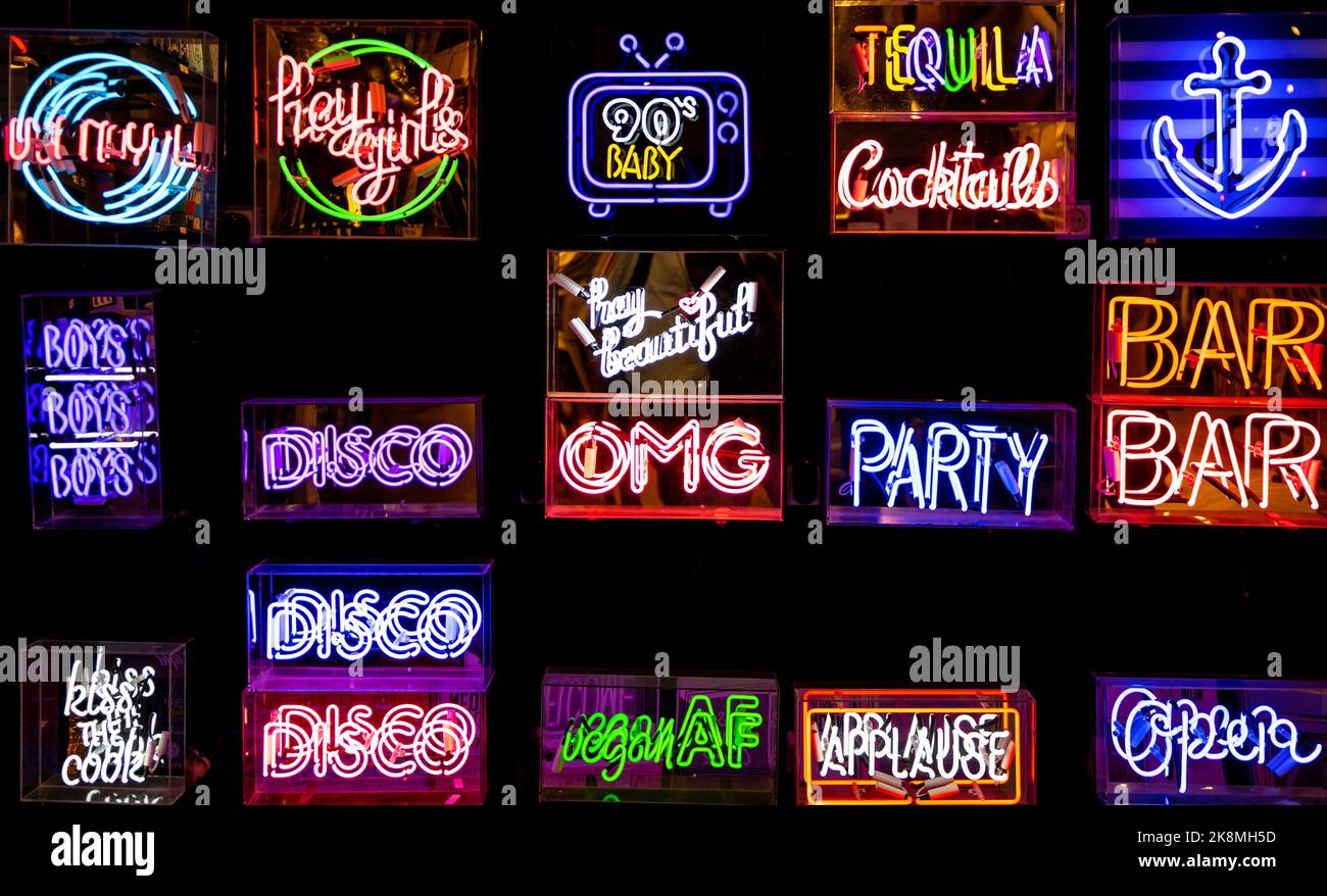 Vibrant colored neon signs. Signs for clients. Indicator signs Stock