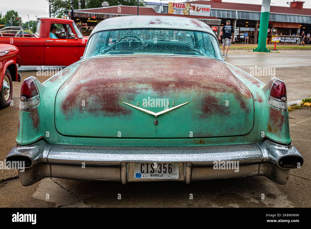 Des Moines, IA - July 01, 2022: High perspective rear view of a 1956 Cadillac 62 Sedan DeVille at a local car show. Stock Photo