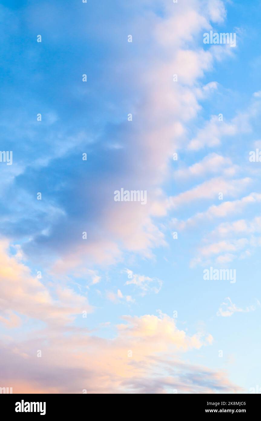 Sky background in pastel tones, romantic sky in soft colors, vast panoramic sky with soft pink clouds Stock Photo
