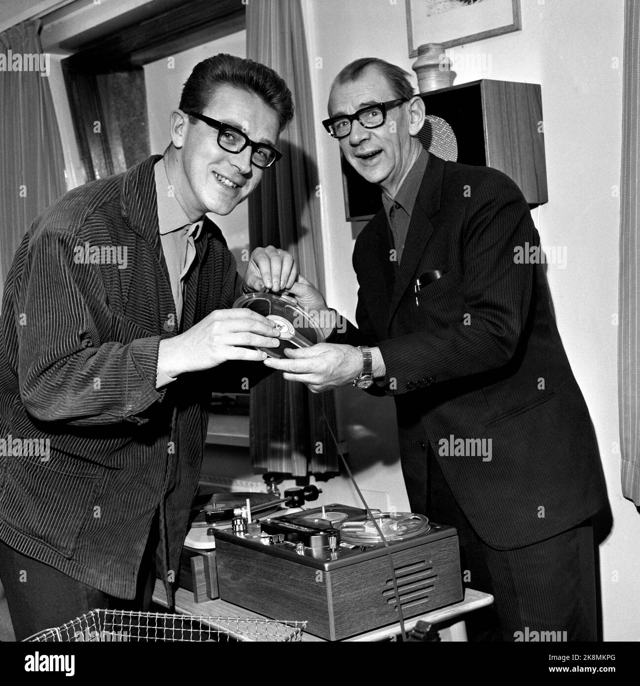 Oslo 19661201. Editorial Secretary Johan Vigeland (t.v.) together with Otto Nilsen with tape recorder in the studio in NRK. Photo Henrik Laurvik / NTB Stock Photo