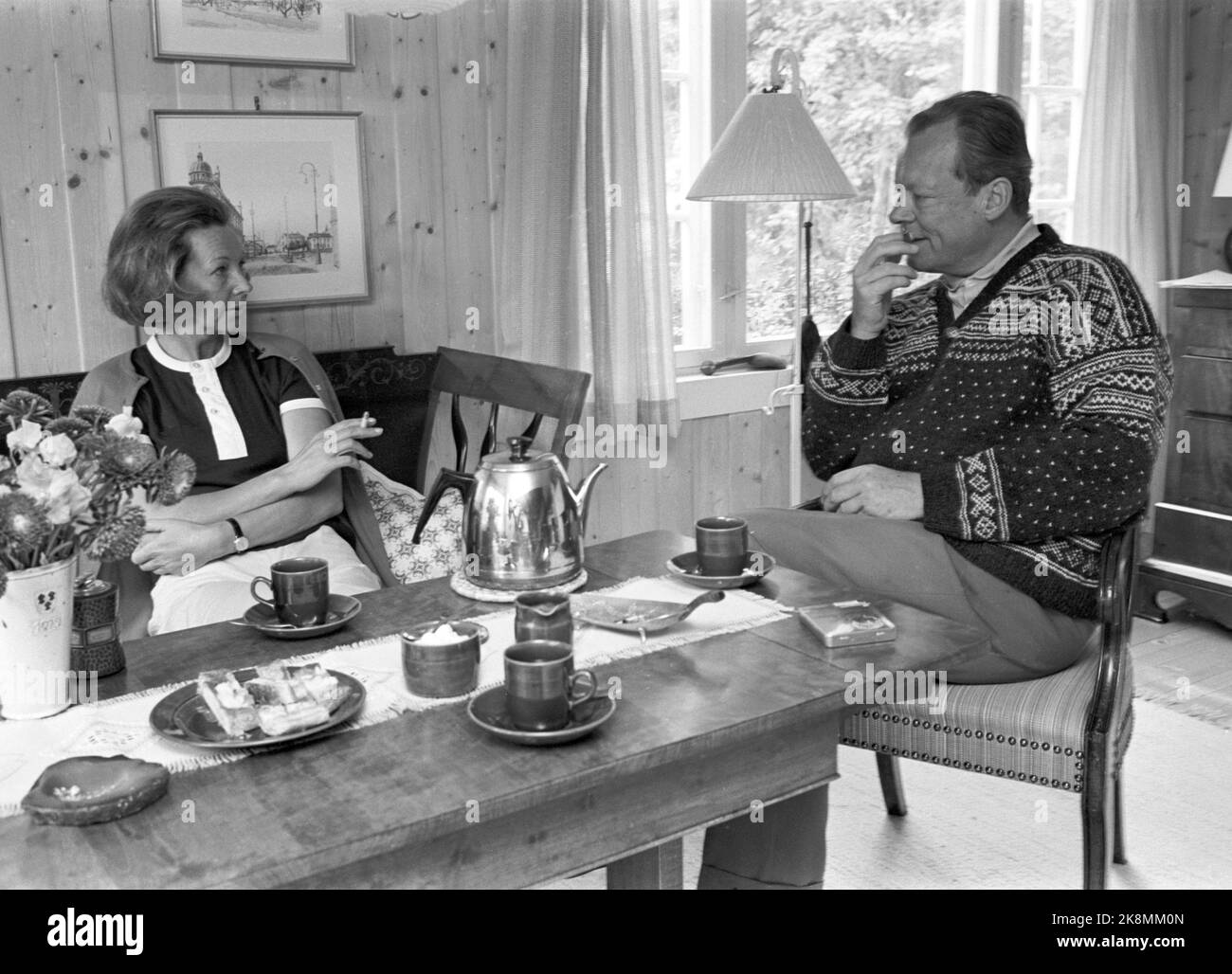 Hamar in the summer of 1970. West Germany's Chancellor Willy Brandt and Mrs. Rut Brandt bought a cabin in Vangsåsen in 1965 at Hamar, and here they spend their summer holidays with the family. Here the couple relaxes in the sofa, with coffee, pastry and smoke. Photo: Ivar Aaserud / Current / NTB Stock Photo