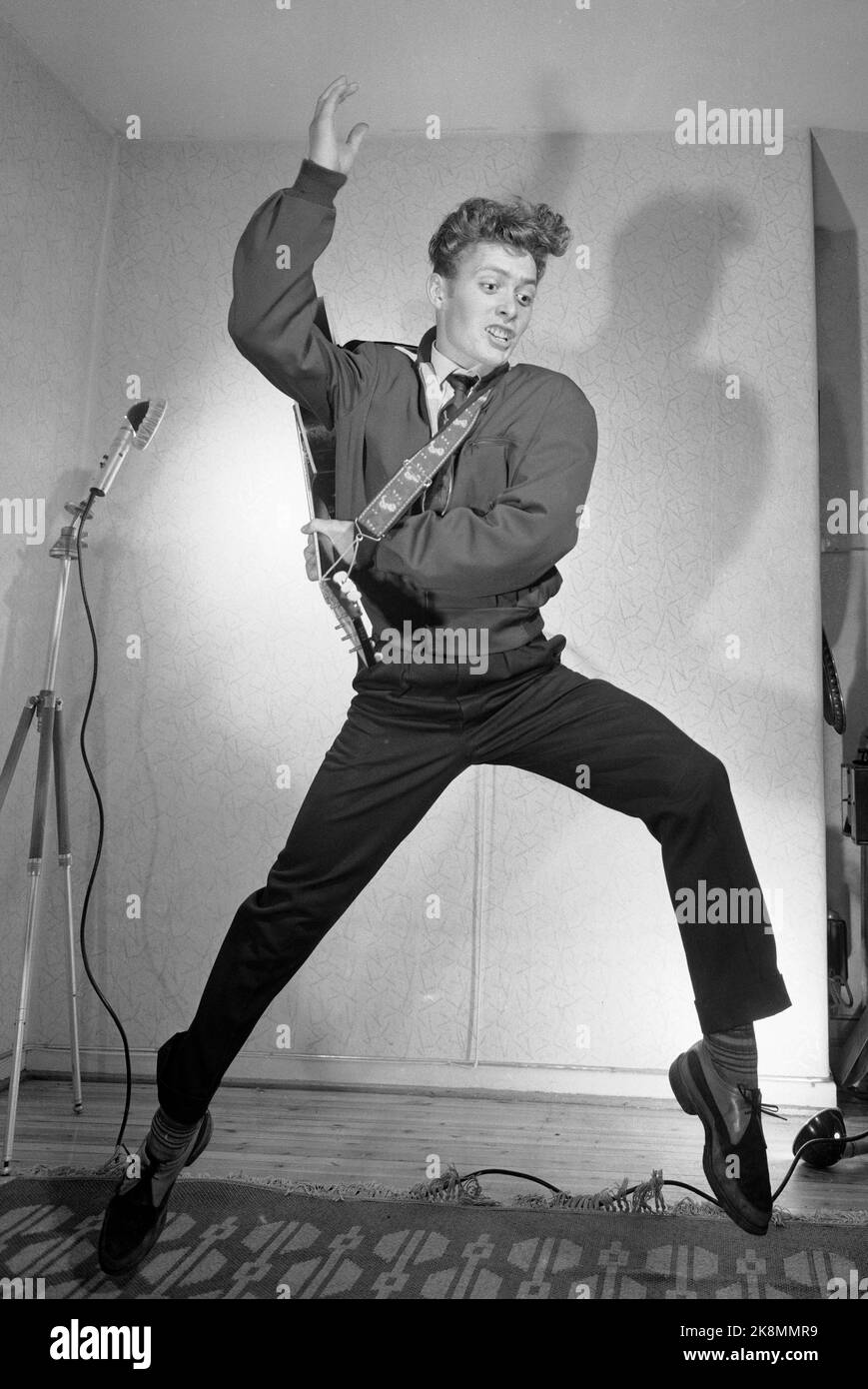Oslo 195808 The rock is raging in Norway, and Per Elvis Granberg / Per Granberg rocks the teens in the sink. Here Per Elvis in action with guitar and hefty dance. Photo: Storløkken / Current / NTB Stock Photo