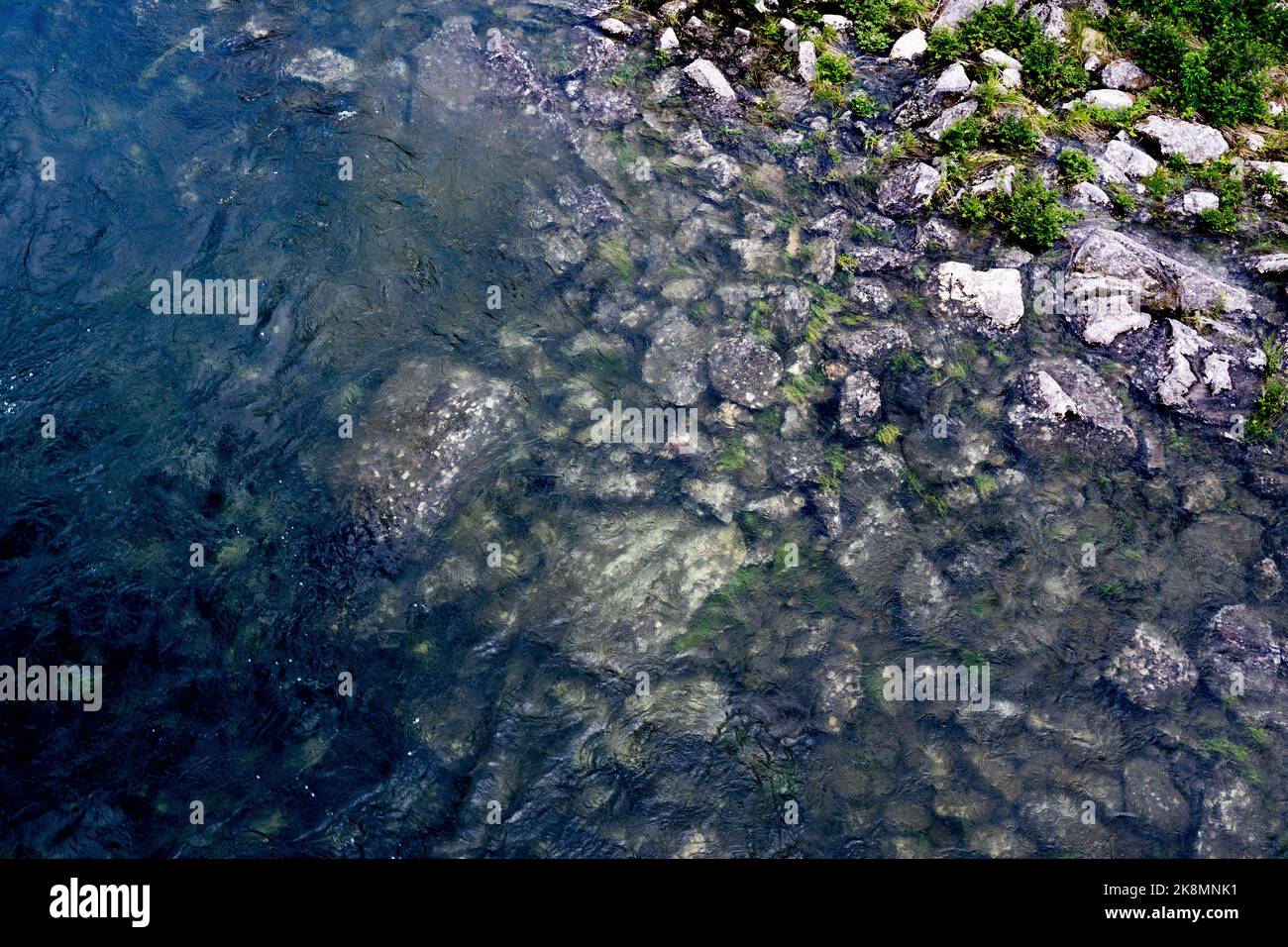 Rocks by the banks of the GudbrandsdalslÃ¥gen River, Oppland, Norway. Stock Photo