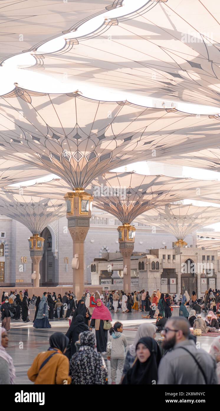 A vertical shot of Muslim people in Al-Masjid an-Nabawi for pray Stock Photo