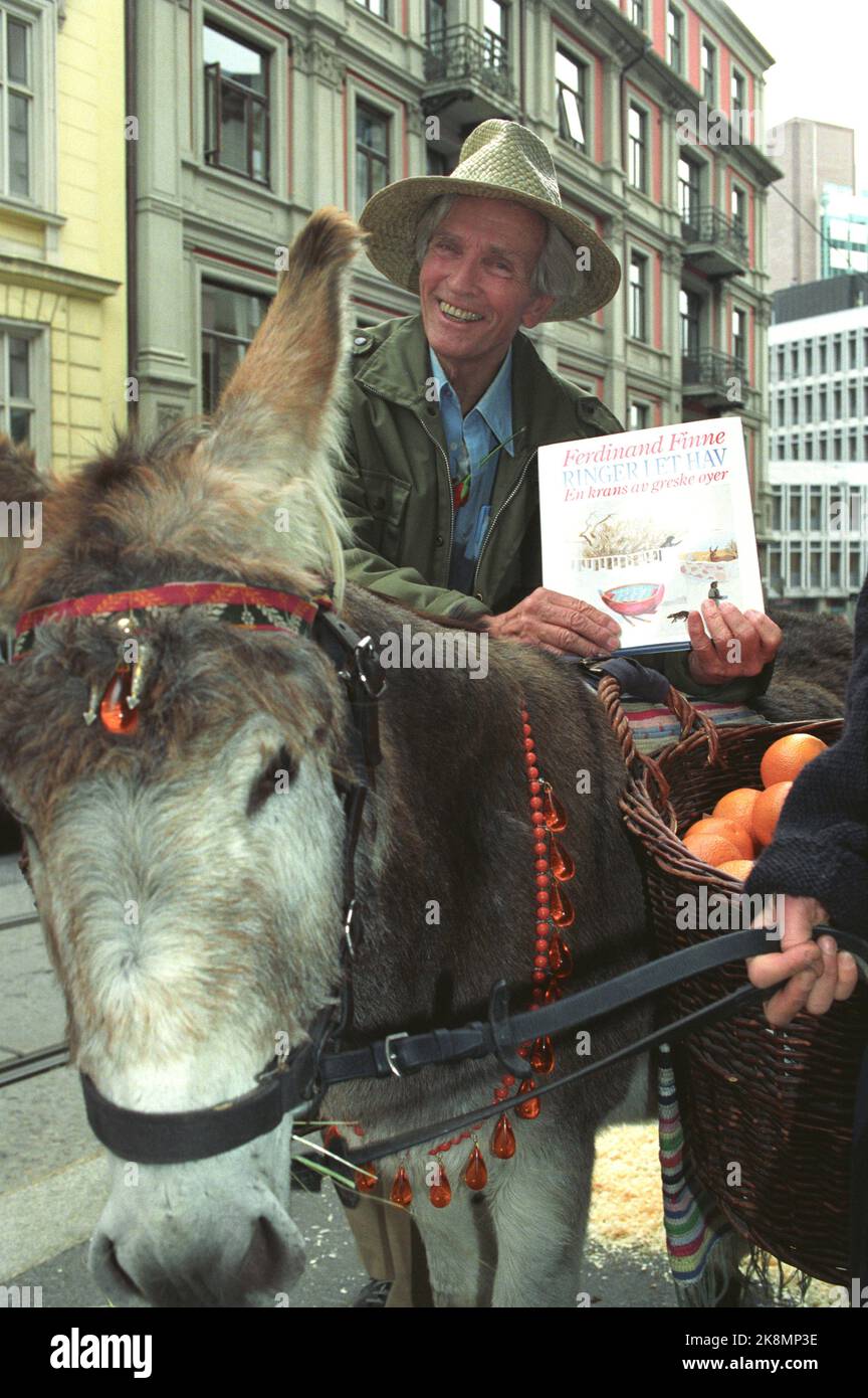 Oslo 19911015 - painter and author Ferdinand Finne presents his new book 'Ringer in a Sea'. Here along with a party -decorated donkey. Photo: Bjørn Sigurdsøn / NTB Stock Photo