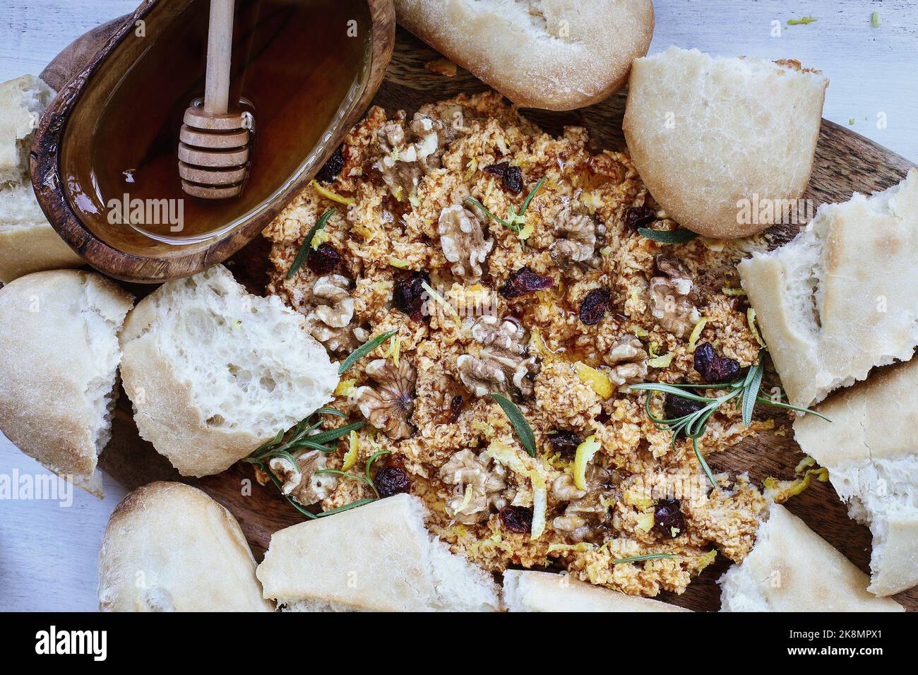 Flat lay of a butter board topped with fresh pumpkin flavored butter