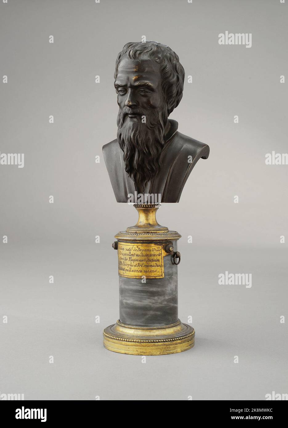 French School, beginning of the 19th Century Bust of Galien Bronze on a marble column cercled with gilded engraved bronze (height 28 cm) Stock Photo