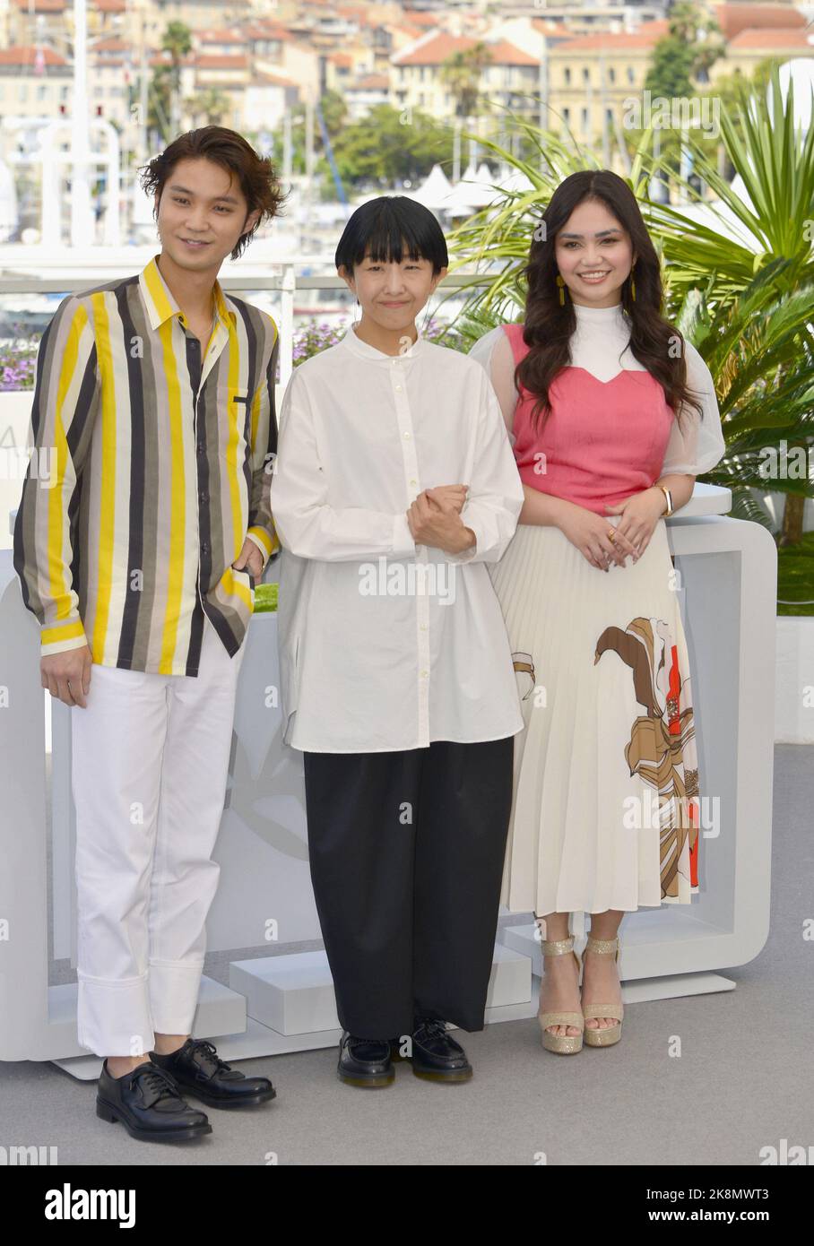 The film crew: Hayato Isomura, Chie Hayakawa, Stefanie Arianne Photocall of the film 'Plan 75' 75th Cannes Film Festival May 20, 2022 Stock Photo