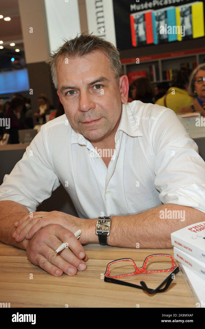 French actor and writer Philippe Torreton at the Salon du Livre in Paris on March 21, 2015. He presents his latest book 'Cher François'. Stock Photo