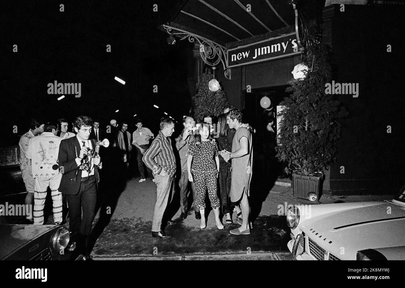 Guests attending the pyjama party organized by the French singer Régine