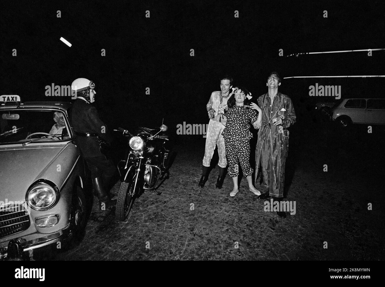 Guests attending the pyjama party organized by the French singer Régine