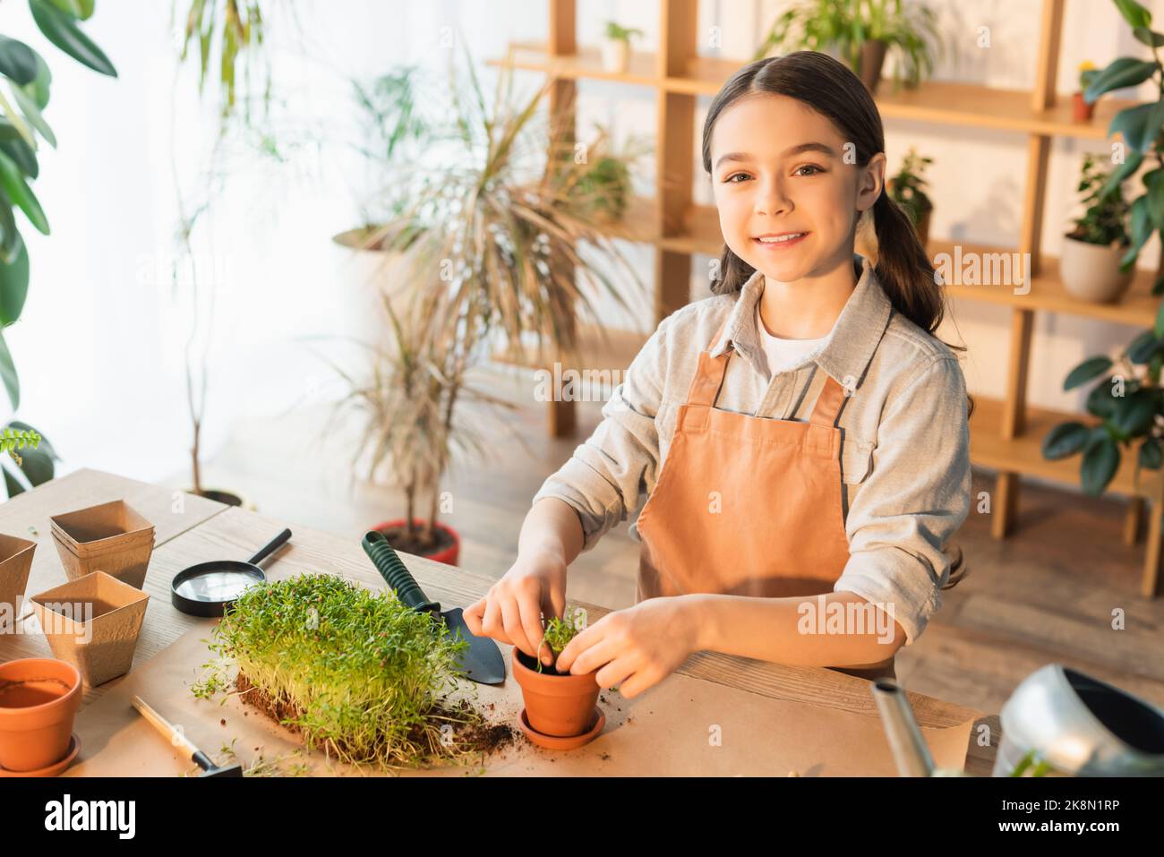 Preteen girl gardening hi-res stock photography and images - Alamy