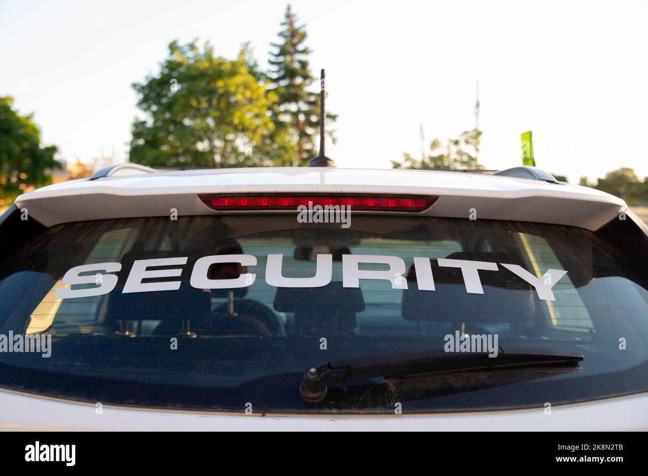 A rear view of security patrol car parked outdoors Stock Photo - Alamy