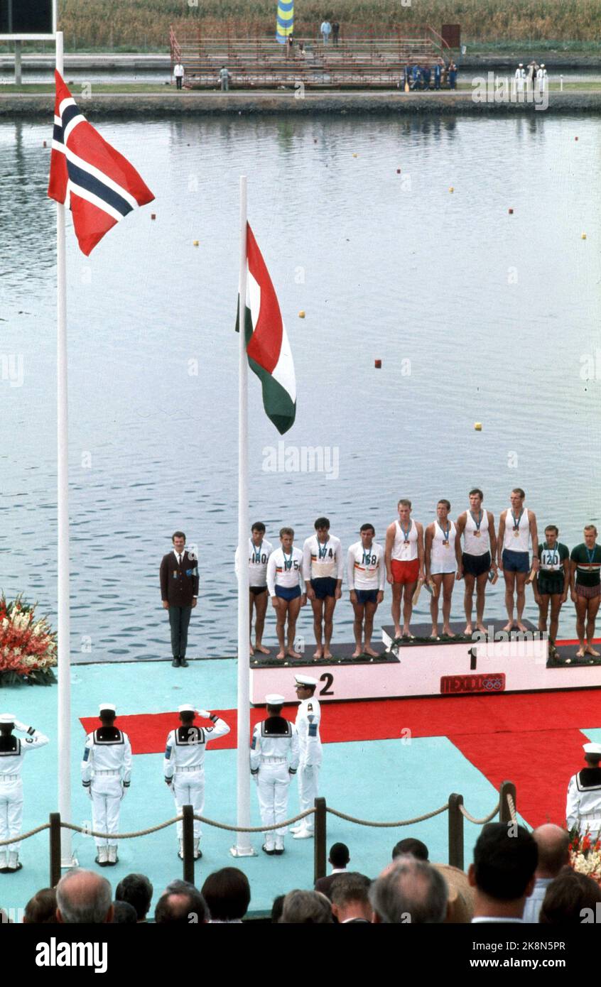 1968 Olympics in Mexico, kayak, K-4 1000 meters. Gold for the Norwegian four. Here with their Olympic gold in upper place on the victory podium, and the Norwegian flag to the top. Eg. Jan Johansen, Tore Berger, Egil Søby and Steinar Amundsen. Romania t.v. Who took silver and t.h.bronze winner Hungary. Photo: EPU / NTB / NTB photographer unknown Stock Photo