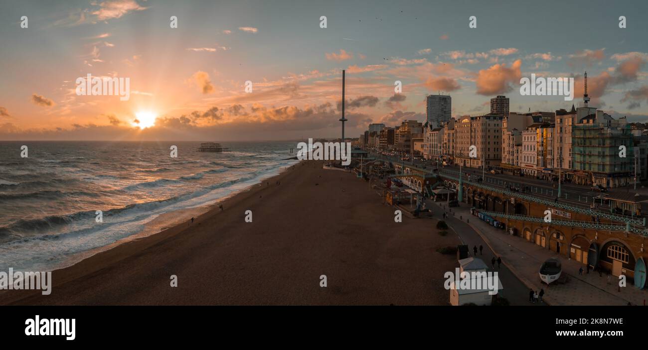 Beautiful Brighton beach view. Magical sunset and stormy weather in