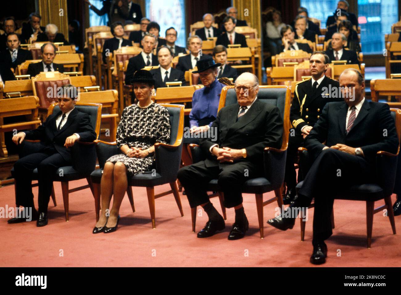 Oslo 1984-09: The 100th anniversary of the introduction of parliamentarism in Norway. The Norwegian royal family present in the Storting on September 30, 1984. Here from: Prince Haakon Magnus, Crown Princess Sonja, King Olav V and Crown Prince Harald. Princess Märtha Louise outside the picture. Photo: Henrik Laurvik Stock Photo