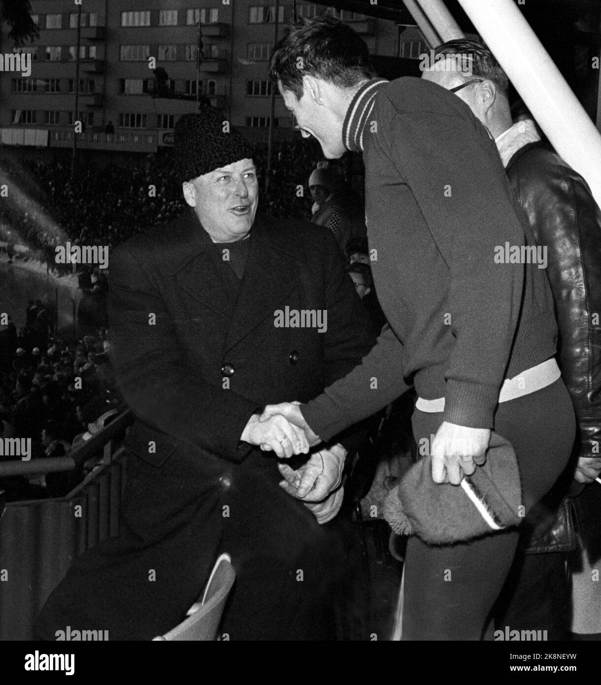Oslo 19680128 skating, fast run, the European Championship on skating at Bislett, for crowded stands. Here the winner Fred Anton Maier gets greeted King Olav on the royal stand. Photo Current / NTB Stock Photo