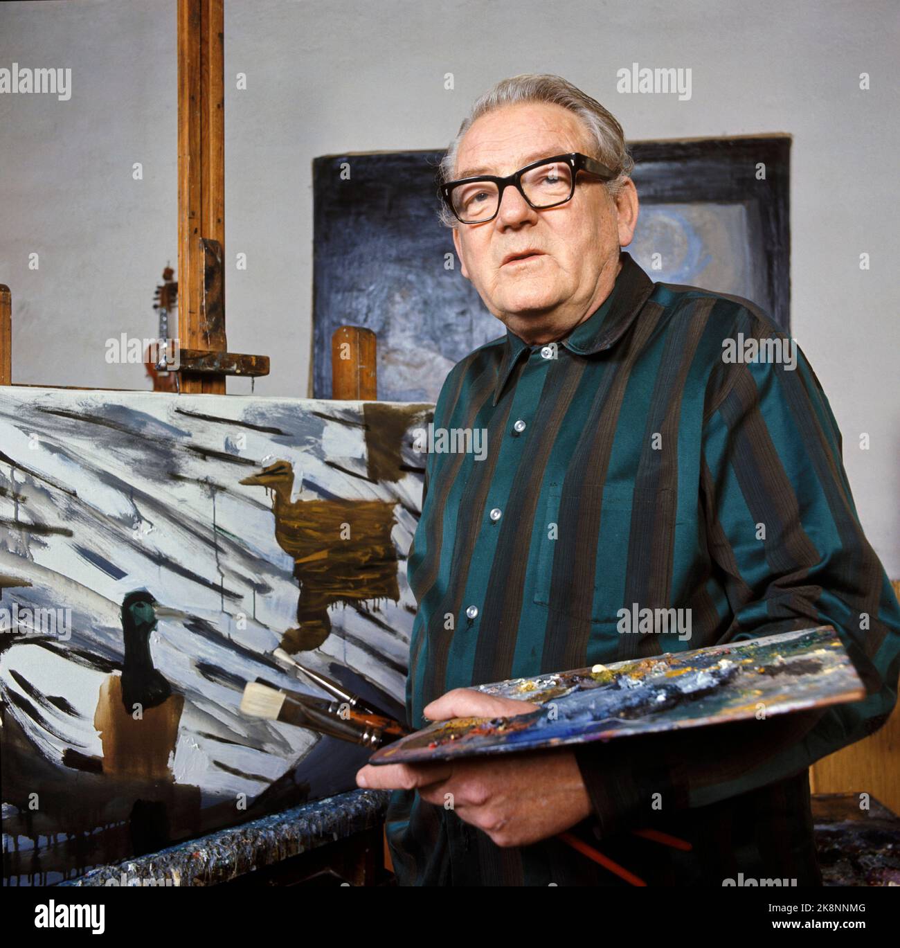Painter kai fjell during work in his studio photo hires stock