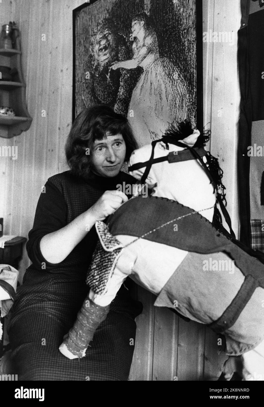 Oslo 19641128. Author Anne Cath. Vestly with a fantasy animal in cloth, a clothes horse. Photo: Current / NTB Stock Photo