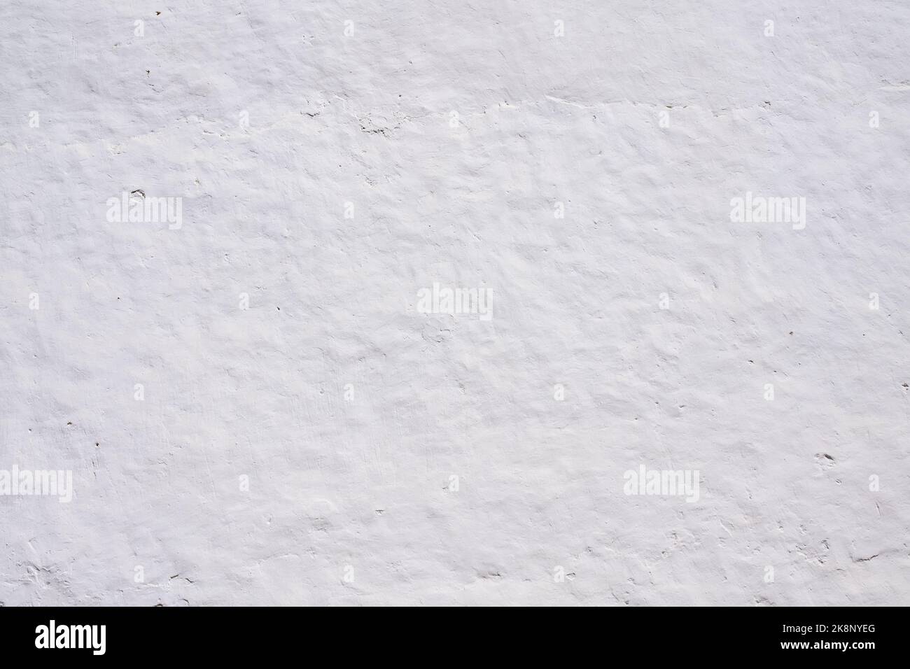 Old cement wall painted white texture  background Stock Photo