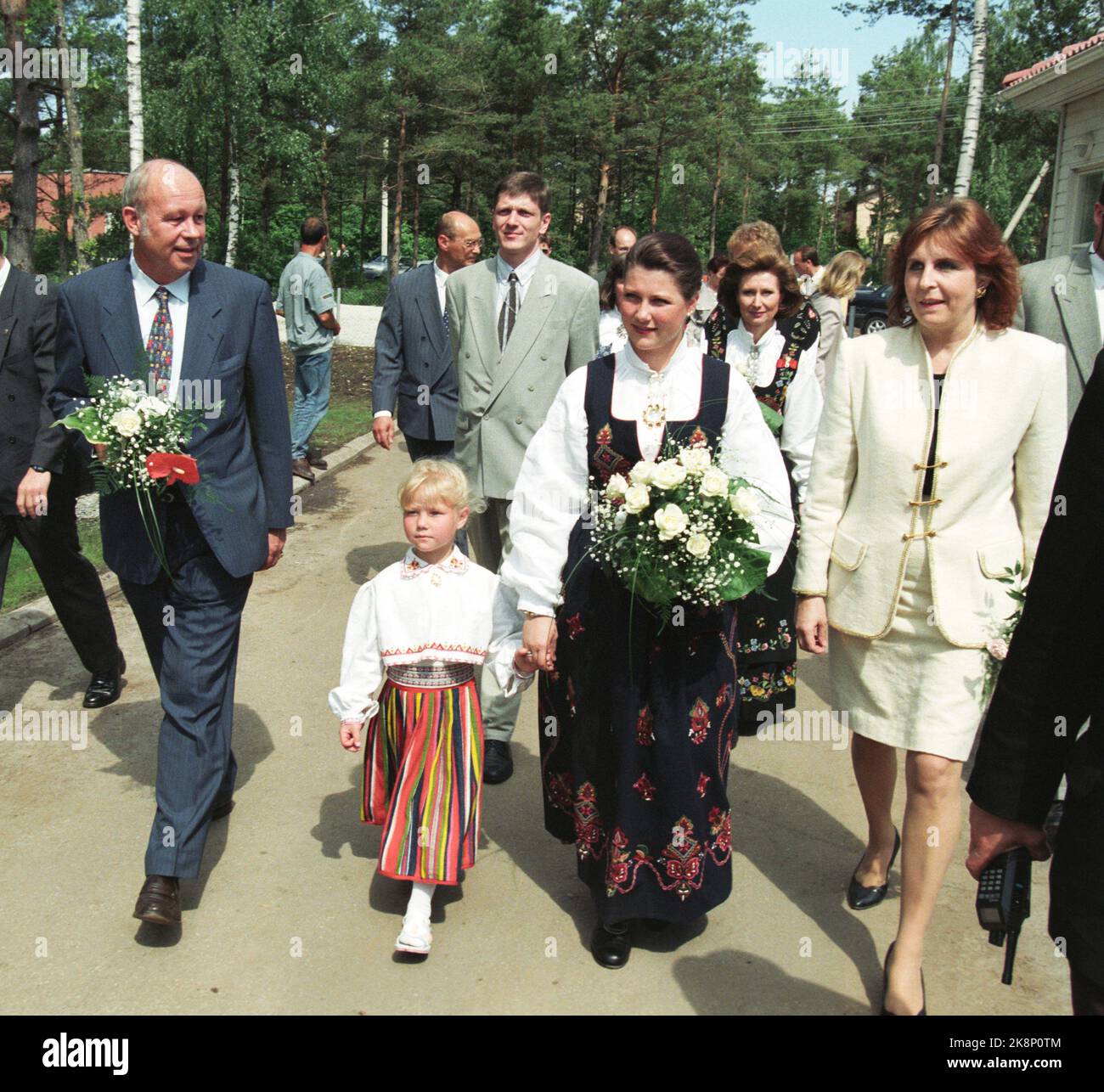 Tallin, Estonia 19950616. Princess Märtha Louise opens SOS Barneby Keila. Here, Märtha arrives in a bunad together a little girl she holds in her hand. Photo: Rune Petter Ness NTB / NTB Stock Photo