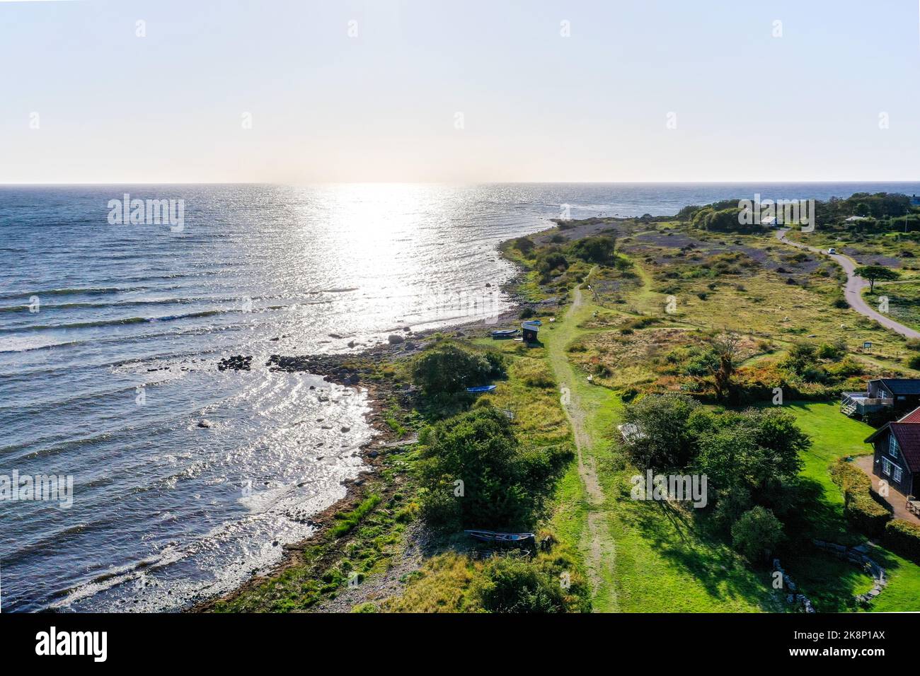 View of the beautiful coastline and sea at Haverdal in south-west Sweden in late afternoon in a sunny, summer's day. Stock Photo