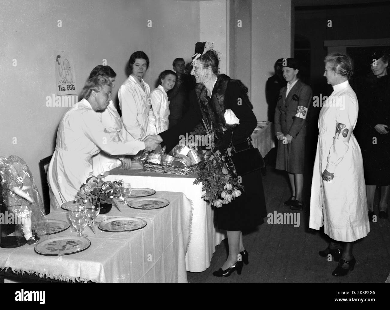 Oslo September 1945. Norwegian Women's Sanitation Association's Bazaar. Crown Princess Märtha visits the bazaar. Photo: R.J. / Ntb Stock Photo