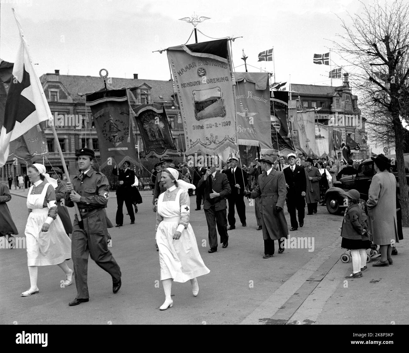 Hamar 19490513. Celebration of Hamar City's anniversary. The large folk train had 30 tabs in the lead of the train. Lotts, fire guards, scouts, singers, students and nurses. All the music bands in Hamar were involved. Ntb archive photo / ntb Stock Photo