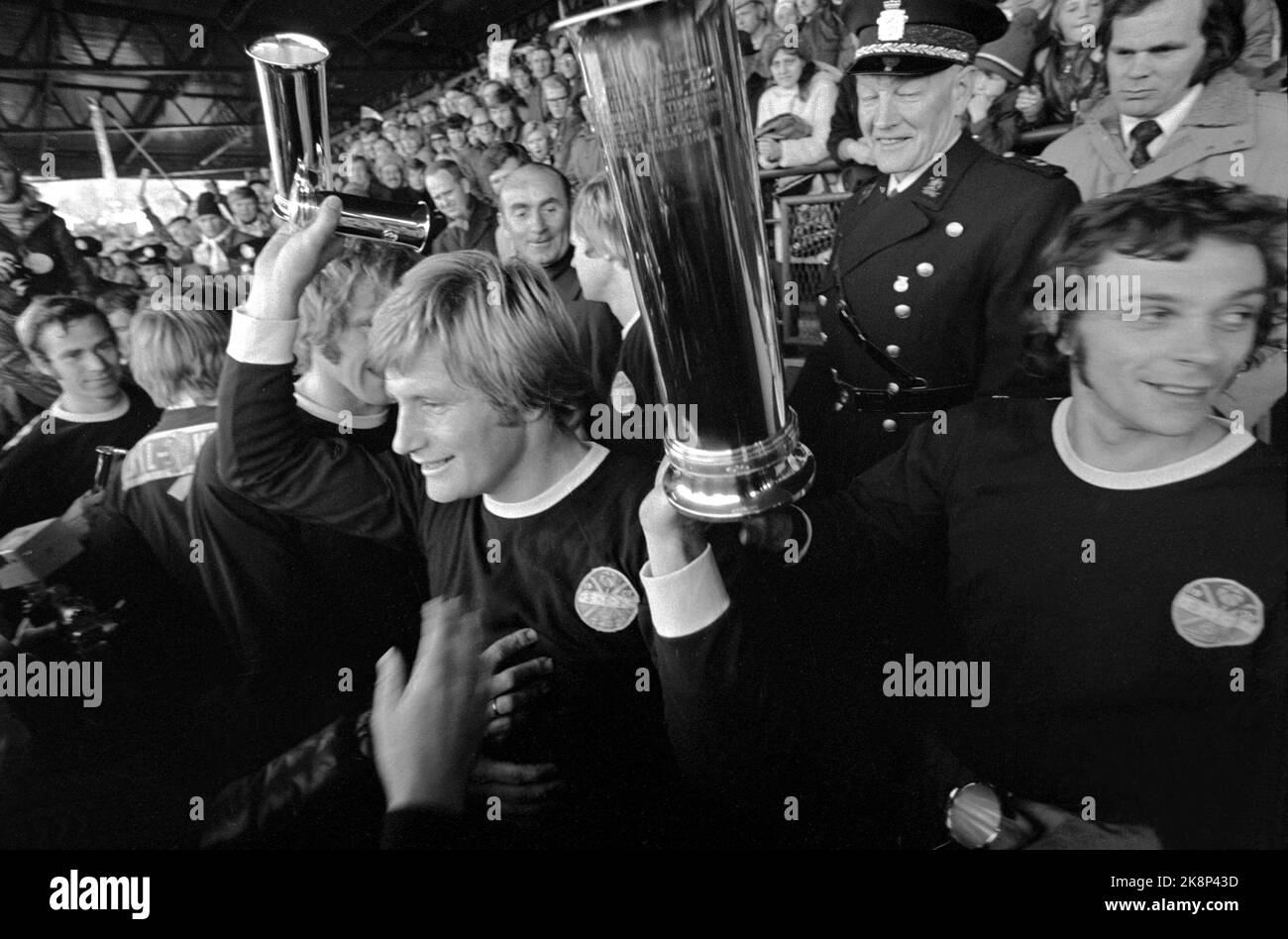 Oslo October 1973. Soccer. Cup final Strømsgodset - Rosenborg 1-0, Ullevaal Stadium. SIF players with trophy cheer. Steinar Pettersen with the King's Cup. Ntb archive photo / ntb Stock Photo
