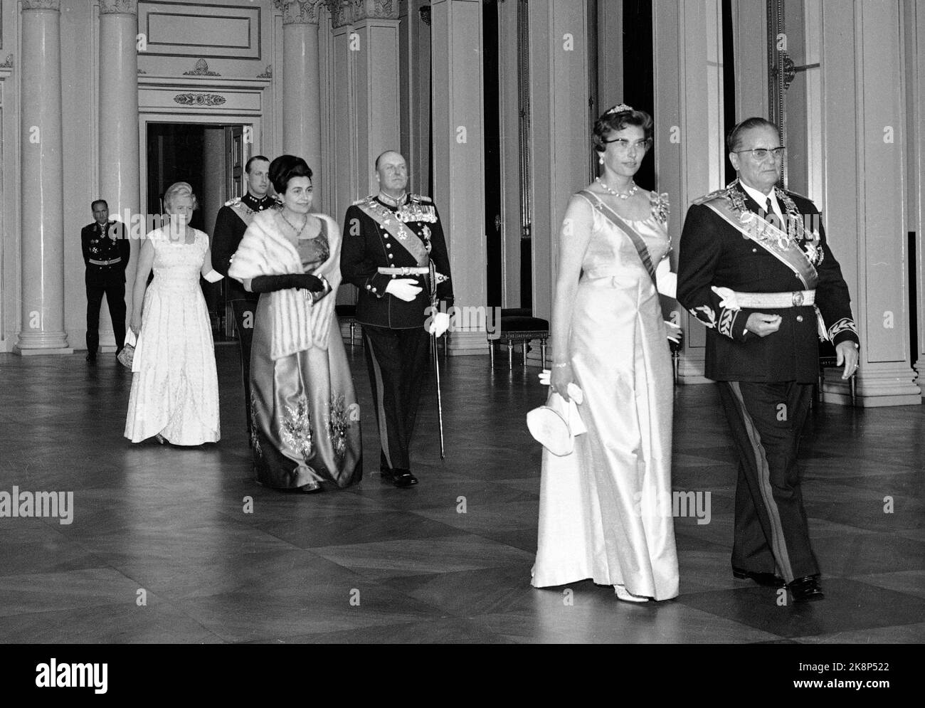 Oslo 19650510 Yugoslavia President Josip Broz Tito on official visit / state visit to Norway. Here the guests train to a gala dinner at the Castle, led by Josip Broz Tito with Princess Astrid Mrs. Ferner, then King Olav with Mrs. Tito and Crown Prince Harald together with Mrs. Storting President Langhelle. Photo: NTB / NTB Stock Photo