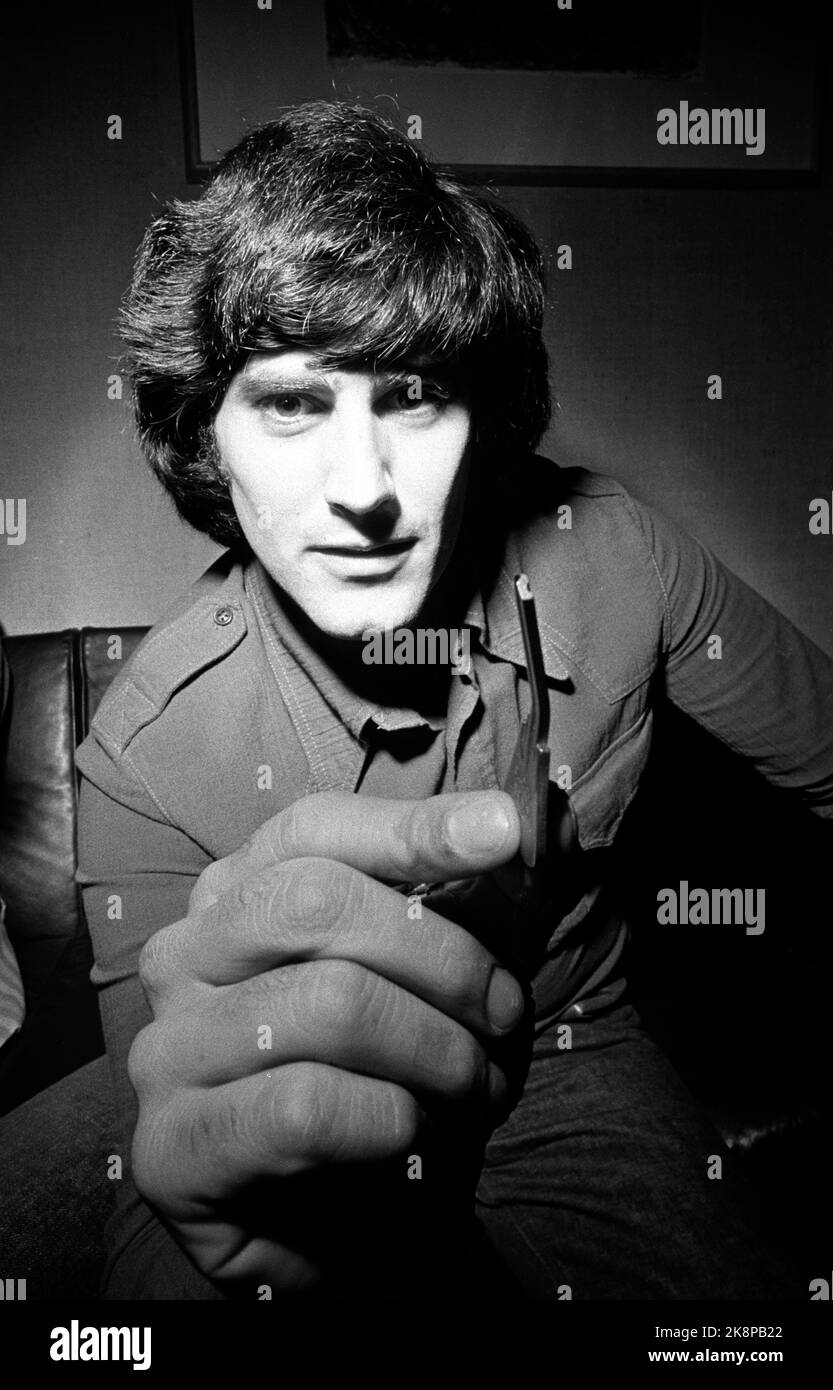 Oslo 19740109. Uri Geller from Israel causes spoons to bend at touch. During a press conference in NRK in connection with a TV program, he asked one of the attendees to a key, which he had to bend. The picture shows Uri Geller with the key. Illusionist. Photo Jan Dahl / NTB / NTB Stock Photo