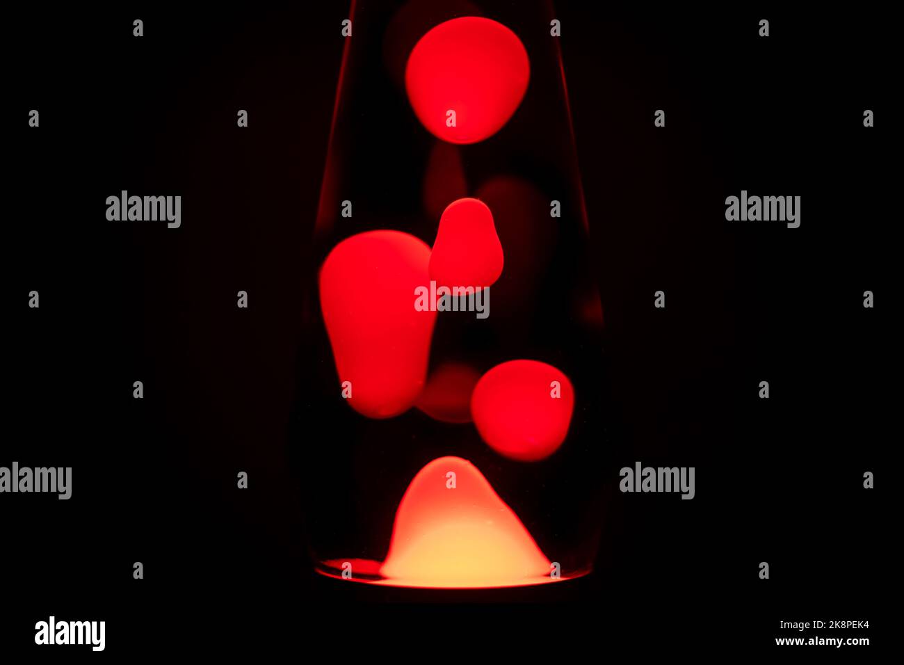 Red, orange and yellow lava lamp, black background Stock Photo Alamy