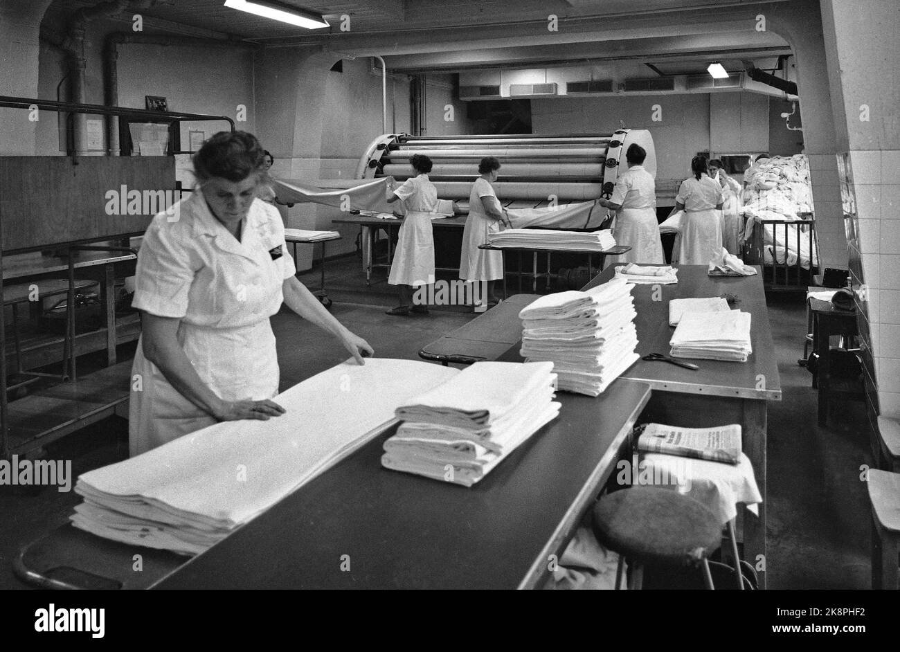 Oslo 19600106. In 1960, NSB had 3212 beds in their sleeping wagons, and they became increasingly popular. Every day, an army of cleaners moved into NSB's area in Lodalen, to wash, clear and change bedding. The laundry is brought here to NSB's laundry in Lodalen, which washes about 3,000,000 bed shifts a year, or nearly 1.5 million kilos of clothes, only from the sleeping cars. Around Christmas there are often 3000 sheets per day! Photo: Ivar Aaserud / Current / NTB Stock Photo