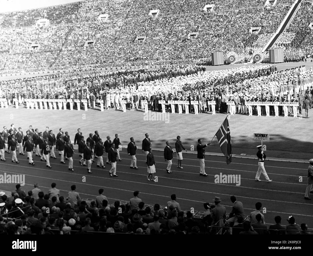 Tokyo, Japan 1964 Summer Olympics in Tokyo. The official opening ceremony. Crown Prince Harald participates in the Norwegian Olympic team in sailing, and is the flag bearer in the Norwegian squad. Ntb archive photo / ntb Stock Photo
